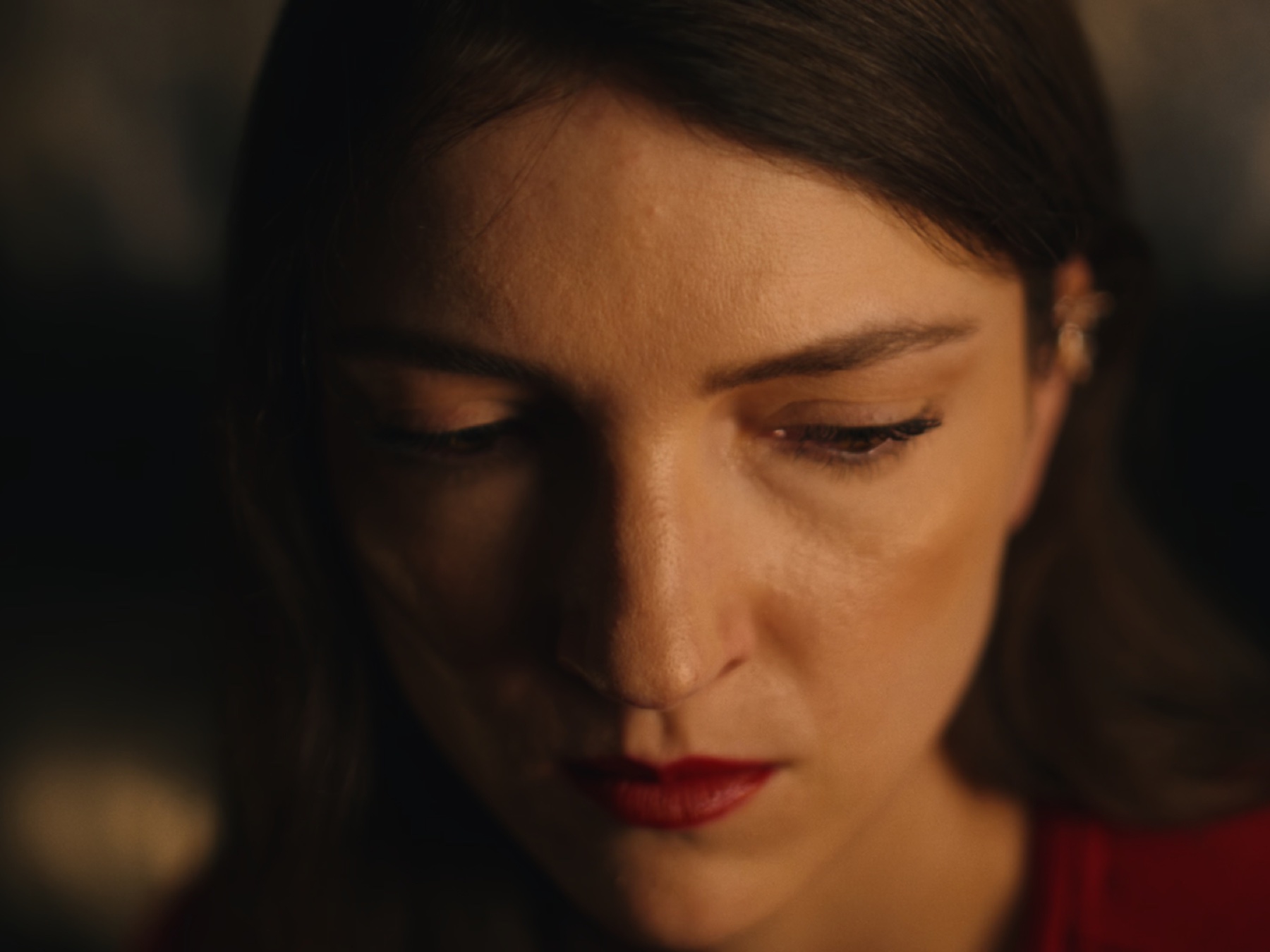 A cinematic frame from Bury Your Dreams